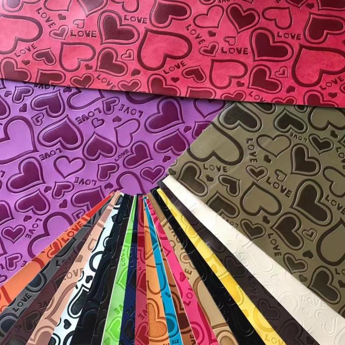 Tùy chỉnh Da tổng hợp dập nổi PU Vinyl đổi màu thời trang cho Túi giày Thảm trải bàn Vải giả da 13